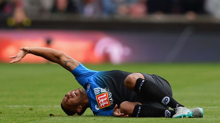 Callum Wilson of Bournemouth is taken off on a stretcher against Stoke 
