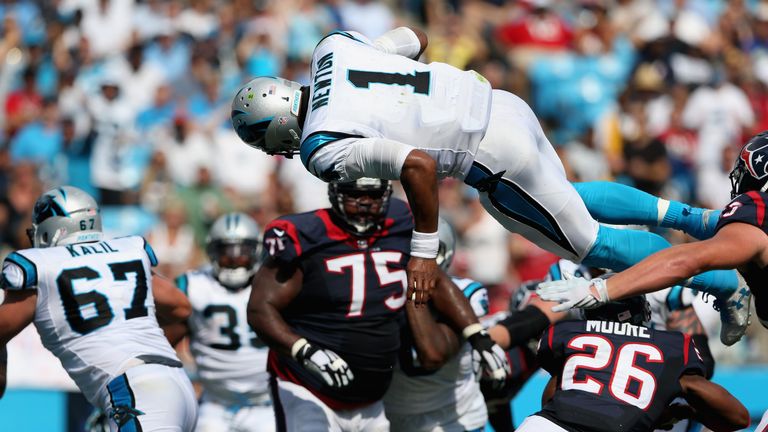 CHARLOTTE, NC - SEPTEMBER 20:  Cam Newton #1 of the Carolina Panthers dives for a touchdown against the Houston Texans during their game at Bank of America