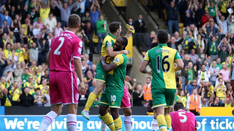 Cameron Jerome of Norwich City celebrates scoring the opening goal against Bournemouth