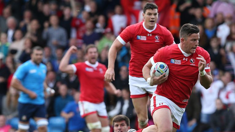 DTH Van Der Merwe of Canada breaks free of the Italian defence to score a try during the 2015 Rugby World Cup