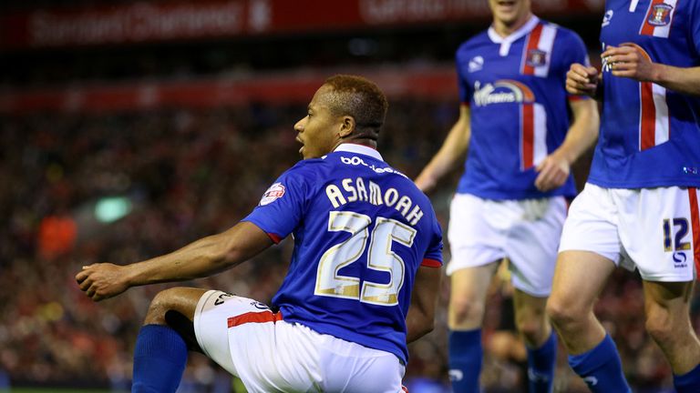 Carlisle's Derek Asamoah celebrates scoring his side's first goal of the game during the Capital One Cup, third round match at Anfield, Liverpool.