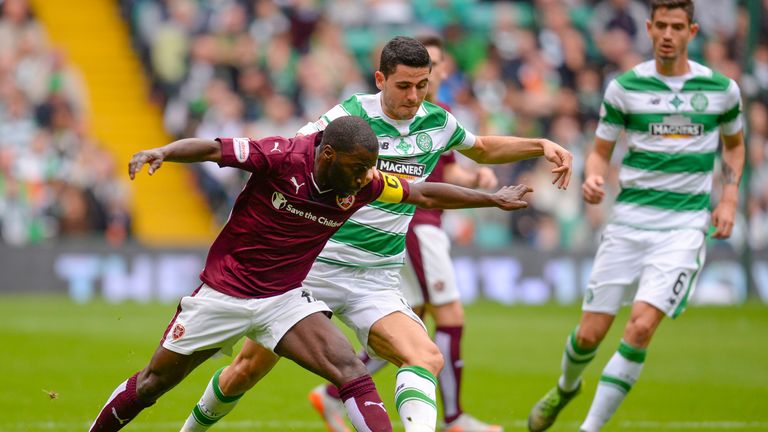 Tom Rogic (right) tries to get the better of Hearts' Morgaro Gomis