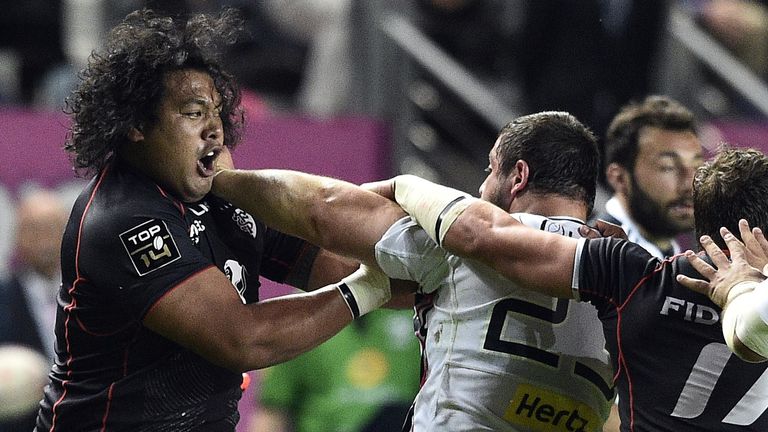 Samoa prop Census Johnston, left, vies for Toulouse against Stade Francais prop Davit Kubriashvili during a French Top 14 match on April 24, 2015, in Paris