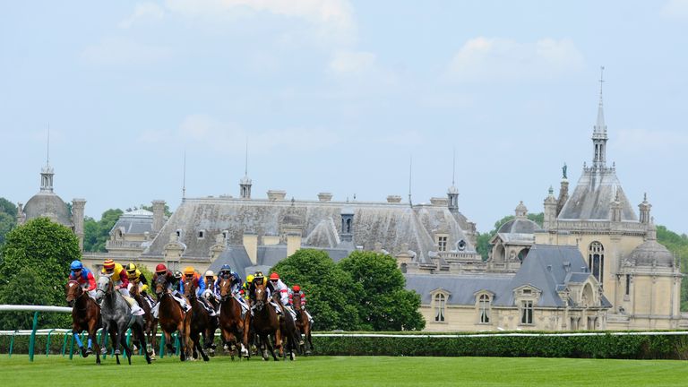 CHANTILLY, FRANCE - JUNE 01:  Runners pass the chateau de chantilly and turn into the straight in The Prix L'Equipe 21 at Chantilly racecourse on June 01, 