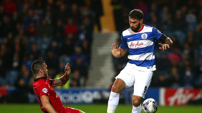 Charlie Austin is tackled by Shane Duffy 