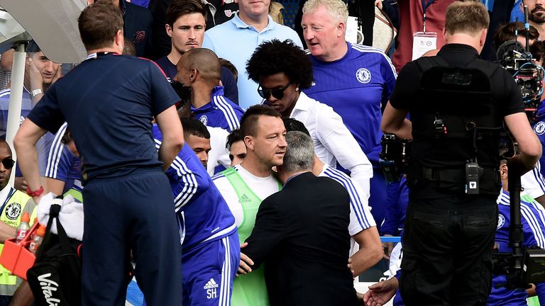 Chelsea manager Jose Mourinho with Chelsea's John Terry after the final whistle of the win over Arsenal