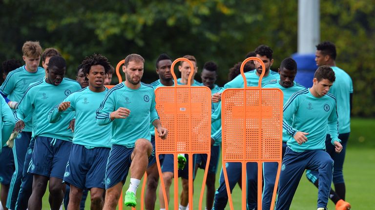 Chelsea's Serbian defender Branislav Ivanovic (4th L) takes part in a training session at Chelsea's training ground, Champions League