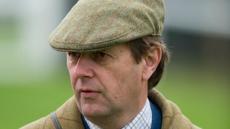 Trainer Chris Wall looks on at Yarmouth racecourse on September 17,  2013.