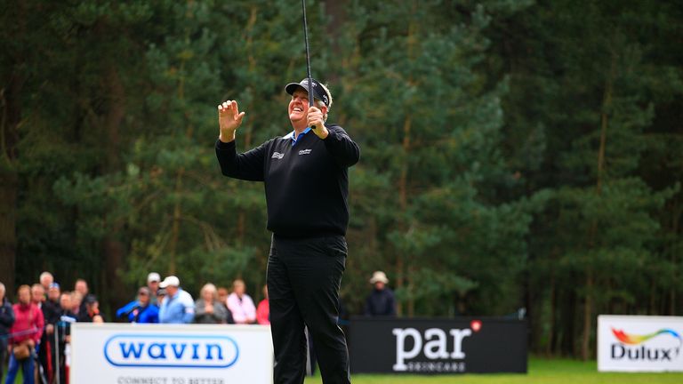 Colin Montgomerie celebrates another putt dropping during his superb second round