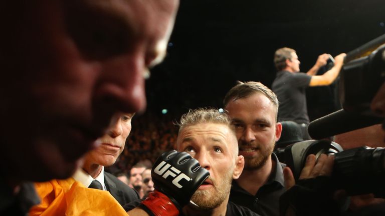 Ireland's Connor McGregor leaves the ring after beating Brazil's Diego Brandao in their Featherweight bout at the UFC Fight Night at the O2 in Dublin.