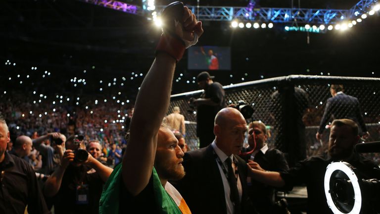 Ireland's Conor McGregor leaves the ring after beating Brazil's Diego Brandao in their Featherweight bout at the UFC Fight Night at the O2 in Dublin.