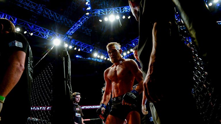 Ireland's Conor McGregor leaves the cage after defeating US Marcus Brimage in the Ultimate Fighting Champhionship, UFC, gala at the Globe Arena in Stockhol
