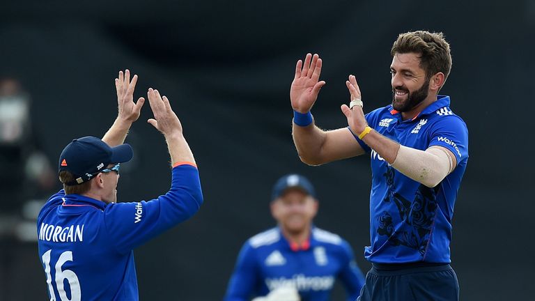 England's Liam Plunkett celebrates taking the wicket of Australia's George Bailey with Eoin Morgan (left), during the fourth match of the Royal London One 