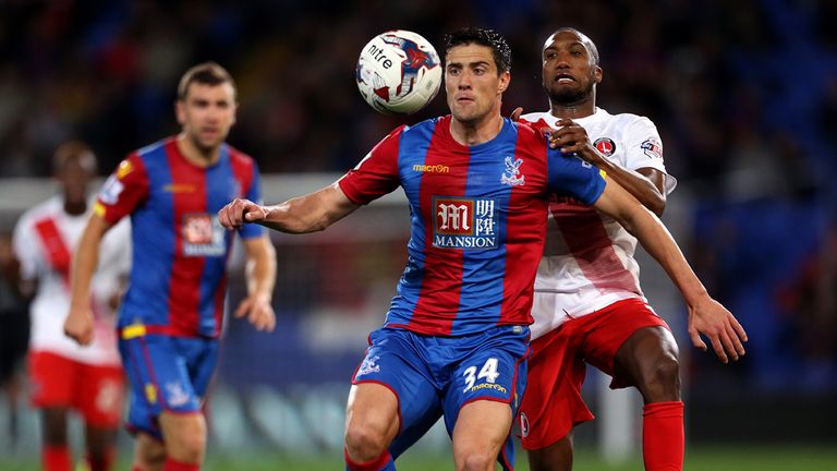 Crystal Palace's Martin Kelly and Charlton Athletic's Zakarya Bergdich (right) battle for the ball