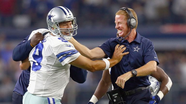 Tony Romo and head coach Jason Garrett celebrate after the Cowboys scored with seconds remaining