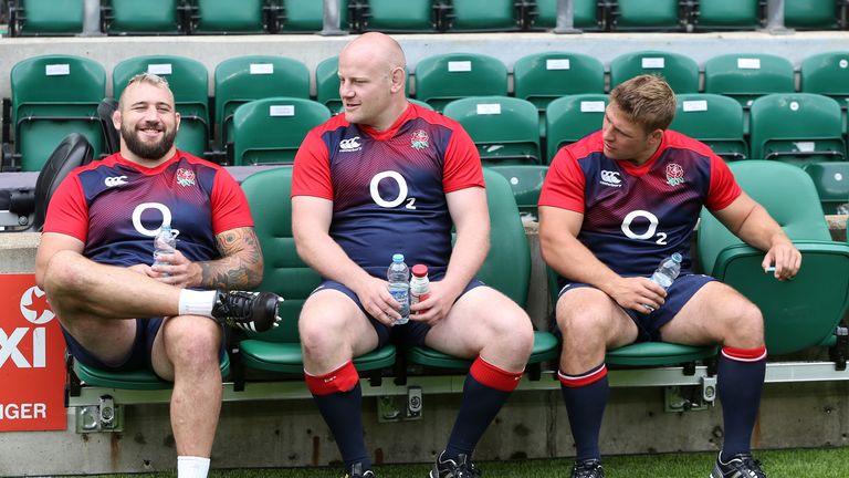 The England front row players Joe Marler (L), Dan Cole and Tom Youngs (R) take a break after the England captain's run