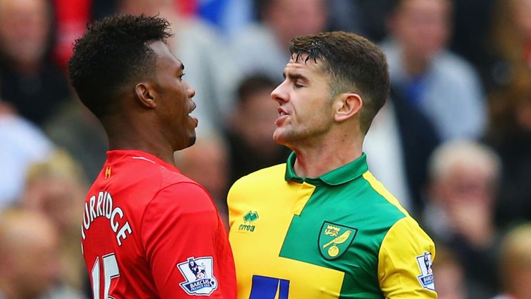 Daniel Sturridge of Liverpool and Robbie Brady of Norwich City clash 