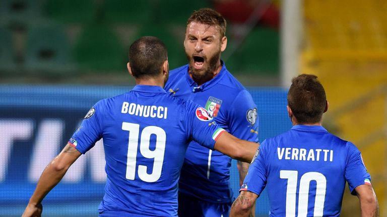 Daniele De Rossi of Italy (C) celebrates after scoring the opening goal