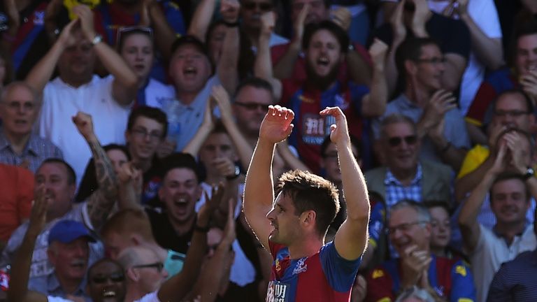 LONDON, ENGLAND - AUGUST 22: Scott Dann of Crystal Palace celebrates scoring his team's first goal  during the Barclays Premier League match between Crysta