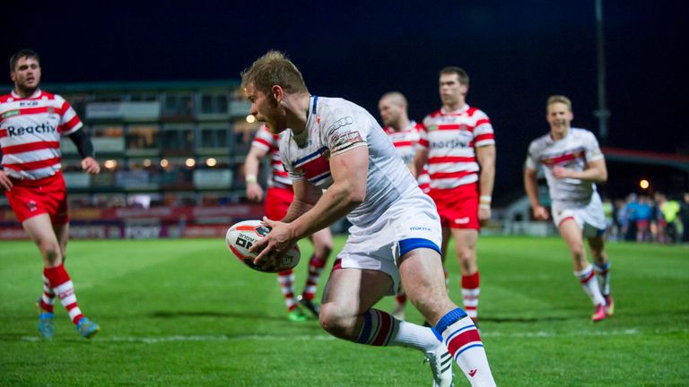 Wakefield's Danny Washbrook scores against Halifax.