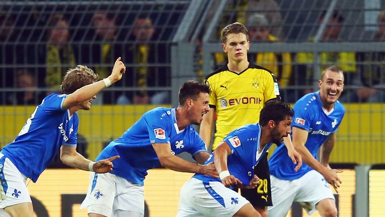 DORTMUND, GERMANY - SEPTEMBER 27: Aytac Sulu of Darmstadt celebrates his team's second goal with team 