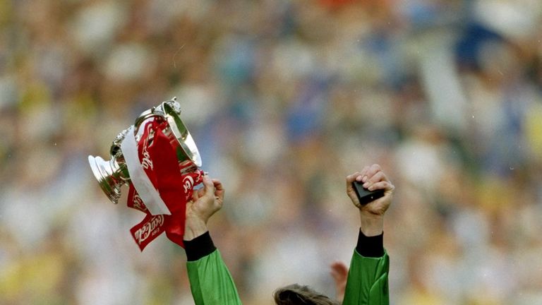 1993:  Arsenal goalkeeper David Seaman celebrates with the trophy after their victory in the Coca Cola Cup final against Sheffield Wednesday at Wembley