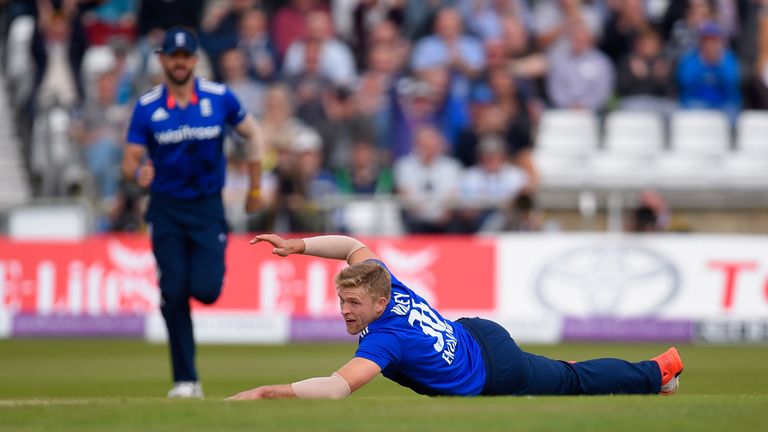 England bowler David Willey celebrates after dismissing Australia batsman Aaron Finch