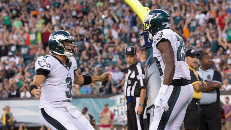 Mark Sanchez #3 and DeMarco Murray #29 of the Philadelphia Eagles react after a Murray scored a touchdown in the first quarte