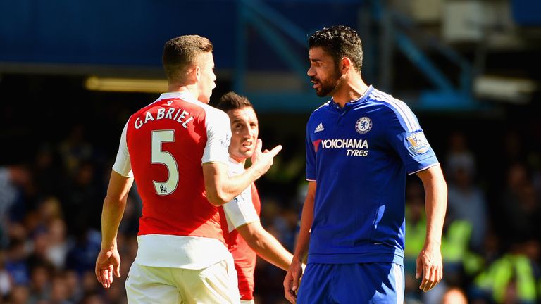 LONDON, ENGLAND - SEPTEMBER 19:  Gabriel of Arsenal and Diego Costa of Chelsea argue during the Barclays Premier League match between Chelsea and Arsenal a