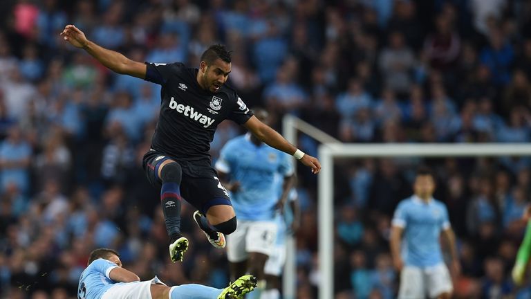 Dimitri Payet strides past Demichelis during West Ham's win over Manchester City