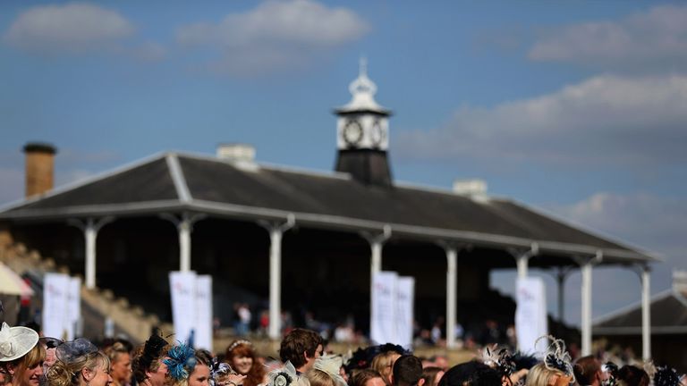 Racegoers enjoy the sunshine on Ladies Day at Doncaster
