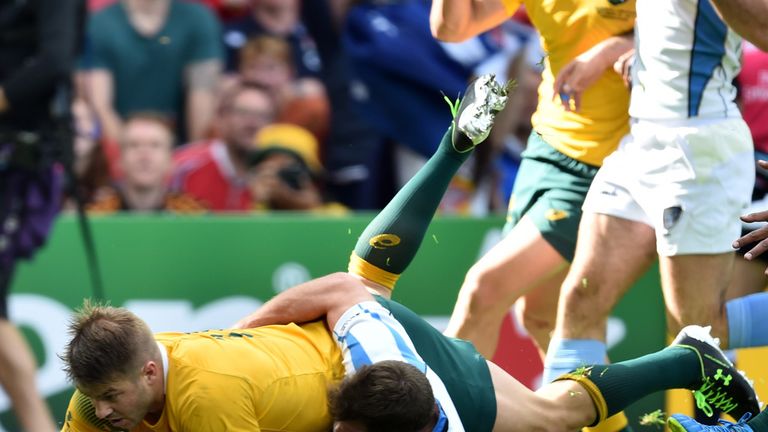 Drew Mitchell scores a try in Australia's Rugby World Cup win over Uruguay