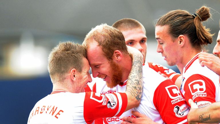 Michael Gardyne (left) and Liam Boyce (centre) both scored for Ross County but they were pegged back by Dundee