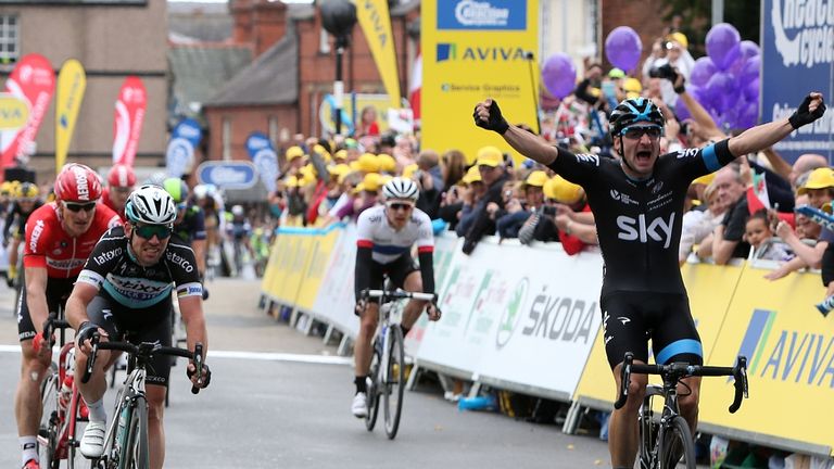 Elia Viviani (right) wins the first stage ahead of Mark Cavendish and Andre Greipel (left) during Stage One of the Tour of Britain 