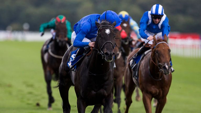 Emotionless and William Buick lead the field home to win the At The Races Champagne Stakes at Doncaster.
