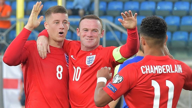 Ross Barkley and Wayne Rooney celebrate for England