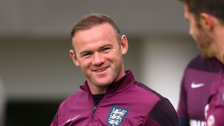 Wayne Rooney of England looks on prior to a England training session at St Georges Park on September 2, 2015 in