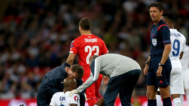 England's Fabian Delph is treated for an injury during the UEFA European Qualifying match at Wembley Stadium, London. 