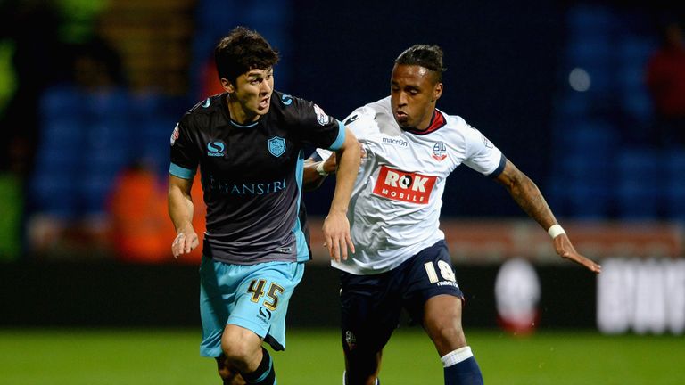 Ferdando Forestieri of Sheffield Wednesday gets past Neil Danns of Bolton during the Sky Bet Championship match between Bol