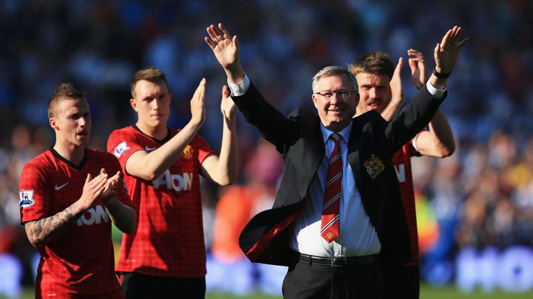 Manchester United manager Sir Alex Ferguson is applauded by players after his 1,500th and final match in charge of the cl