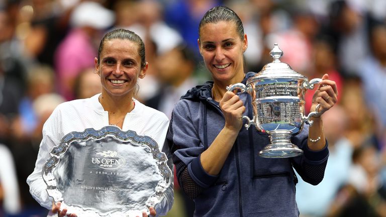 Flavia Pennetta and Roberta Vinci pose with their trophies after their Women's Singles Final match on Day Thirteen of the 2015 US Open