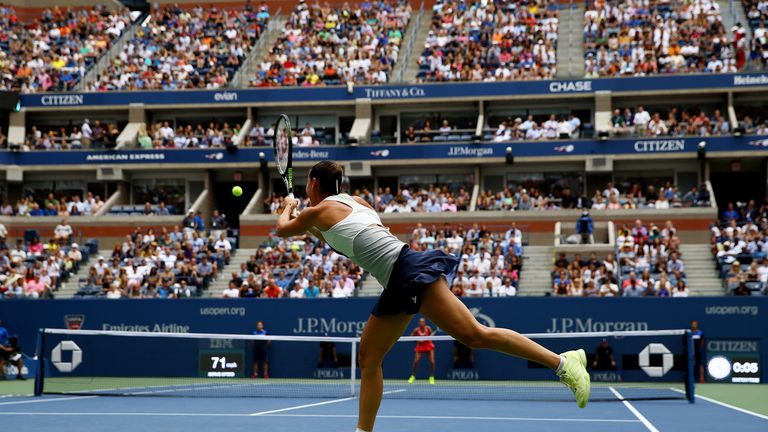 NEW YORK, NY - SEPTEMBER 12:  Flavia Pennetta of Italy returns a backhand shot to Roberta Vinci of Italy during their Women's Singles Final match on Day Th