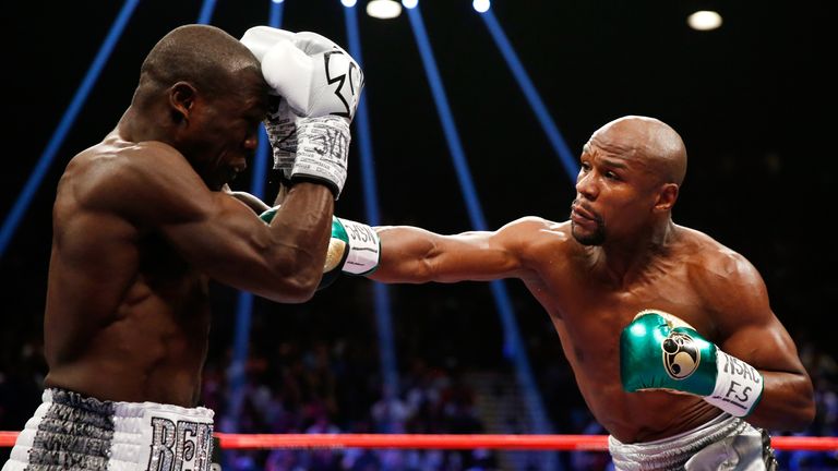 Floyd Mayweather Jr. throws a right at Andre Berto during their WBC/WBA welterweight title fight at MGM Grand Garden Arena o