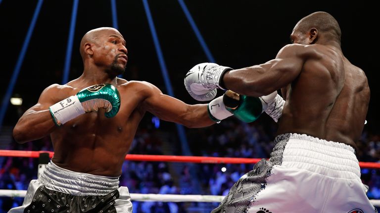 Floyd Mayweather Jr. throws a left at Andre Berto during their WBC/WBA welterweight title fight at MGM Grand Garden Arena on