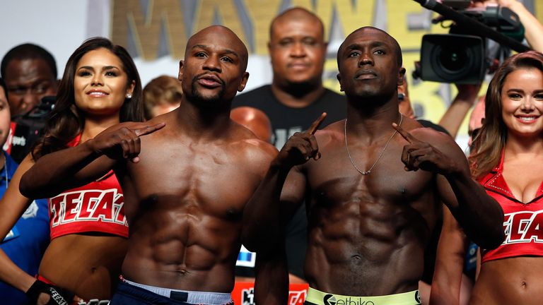 Floyd Mayweather and Andre Berto face off during their official weigh-in at MGM Grand Garden Arena