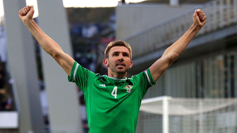 Northern Ireland's Gareth McAuley celebrates scoring his side's first goal of the game
