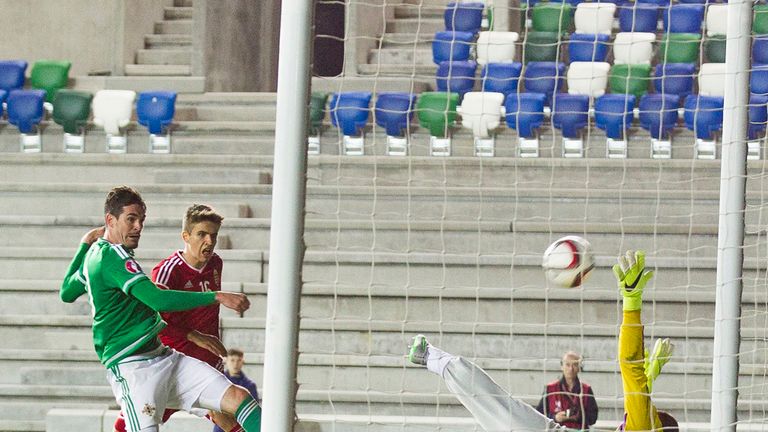Northern Ireland's Kyle Lafferty scores his side's first goal of the game during the UEFA European Championship Qualifying match at Windsor Park, Belfast. 
