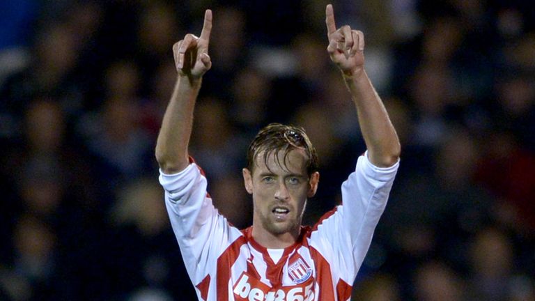 Stoke's Peter Crouch celebrates scoring the opening goal during the Capital One Cup, third round match at Craven Cottage, London.