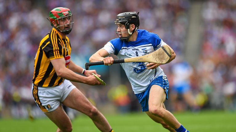 Waterford midfielder Jamie Barron takes on Eoin Larkin