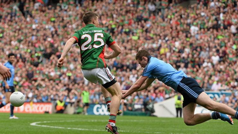 Mickey Sweeney's shot is blocked down by Jack McCaffrey